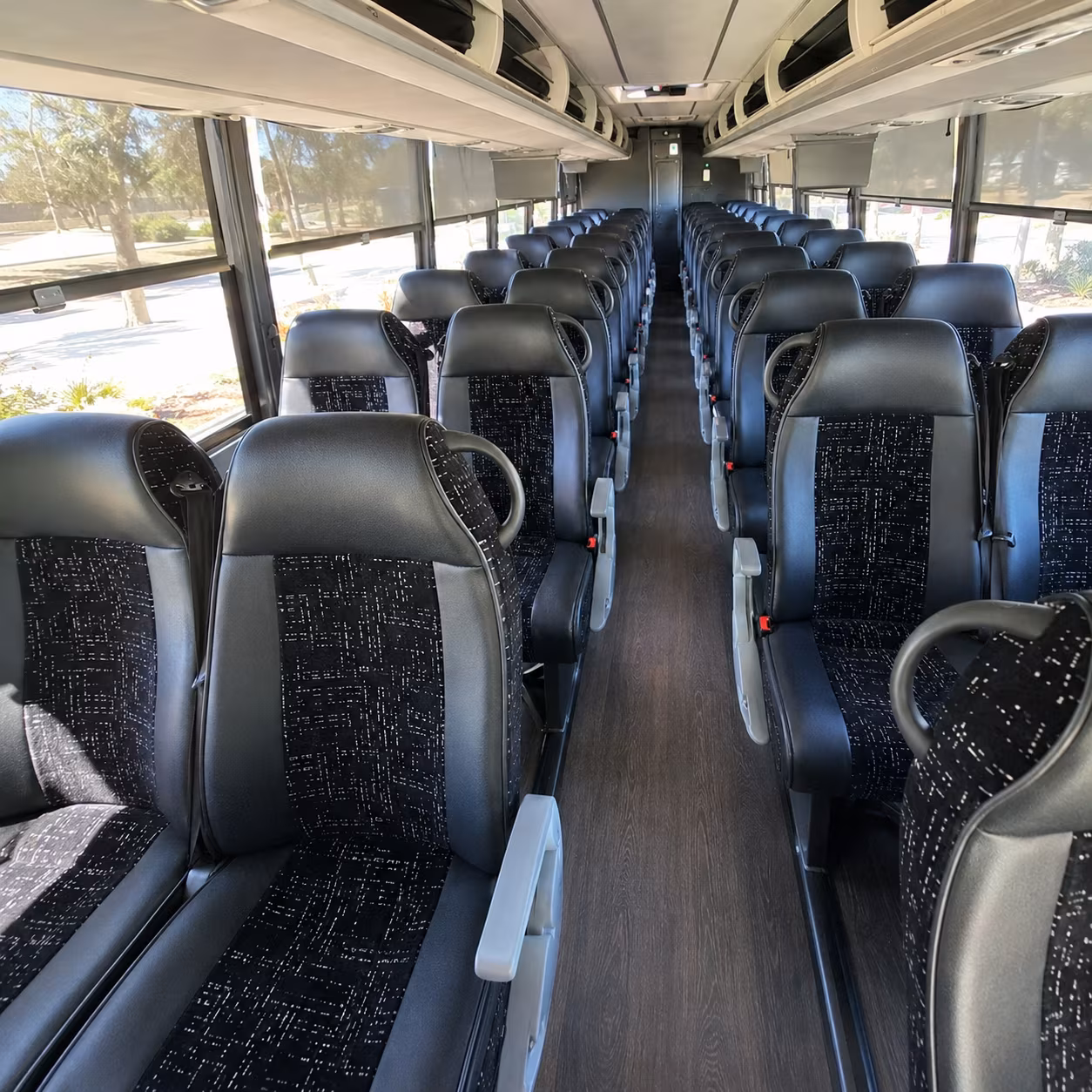 how distance and duration affect charter bus rates in kentwood michigan
